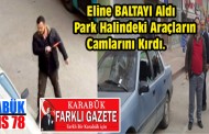 Baltayla araçların camlarını parçaladı.